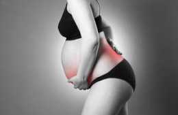 懷孕6個月突然覺得背痛難忍，這是正常的嗎？會不會有不良影響